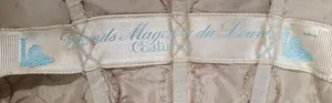 Label van Grands Magasins du Louvre
