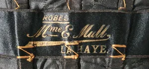 Label van Madame E. Mull
