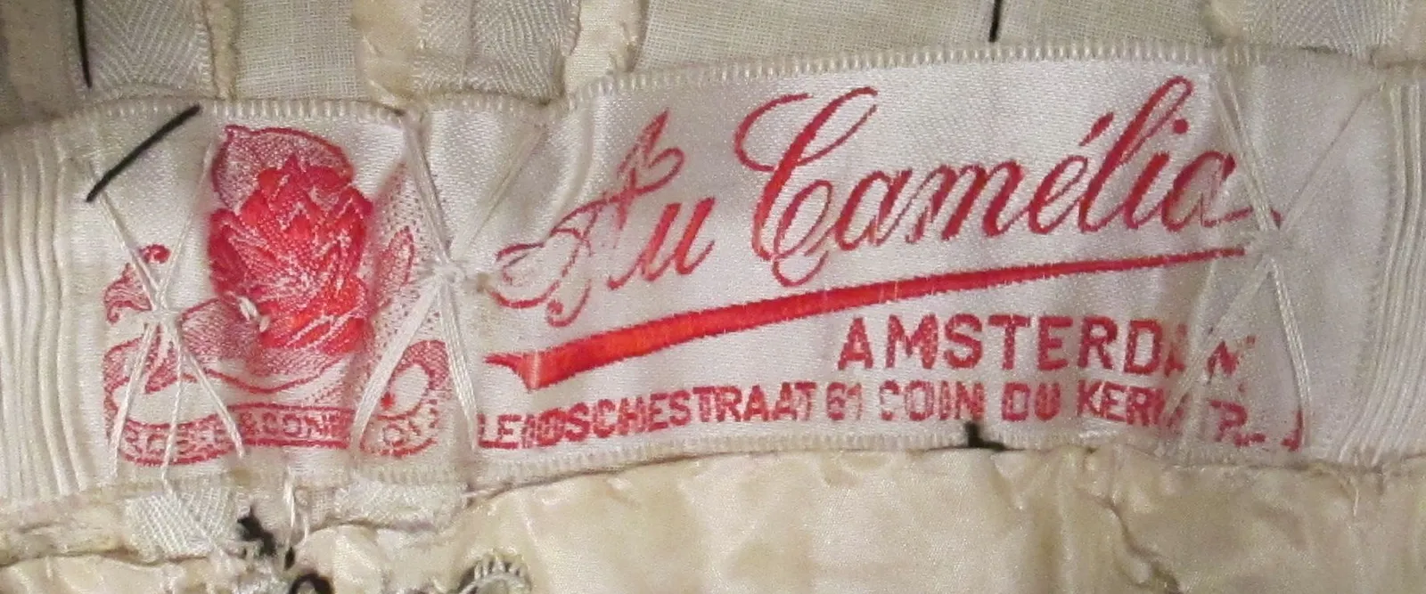 Label van Au Camélia