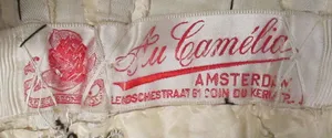 Label van Au Camélia
