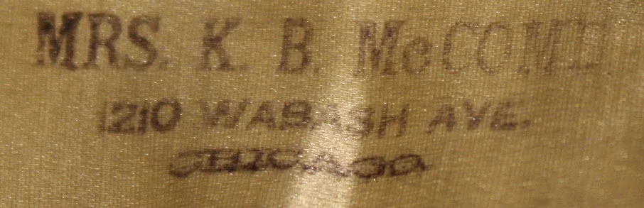 Label van Mrs. K. B. McComb