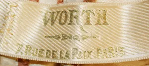 Label van House of Worth