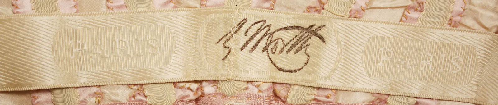 Label van House of Worth