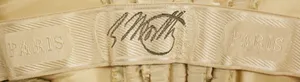 Label van House of Worth