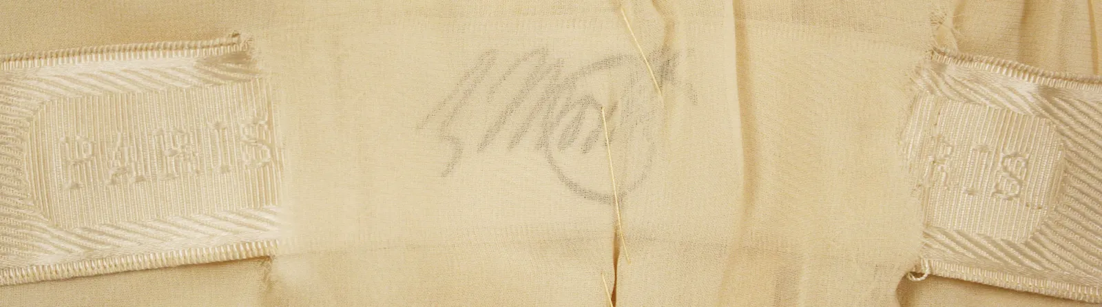 Label van House of Worth