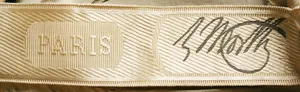 Label van House of Worth