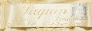 Label van House of Paquin