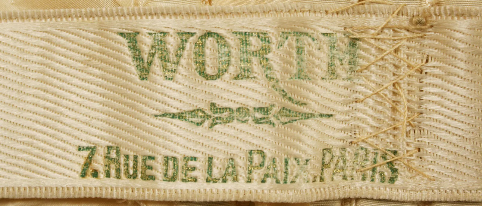 Label van House of Worth