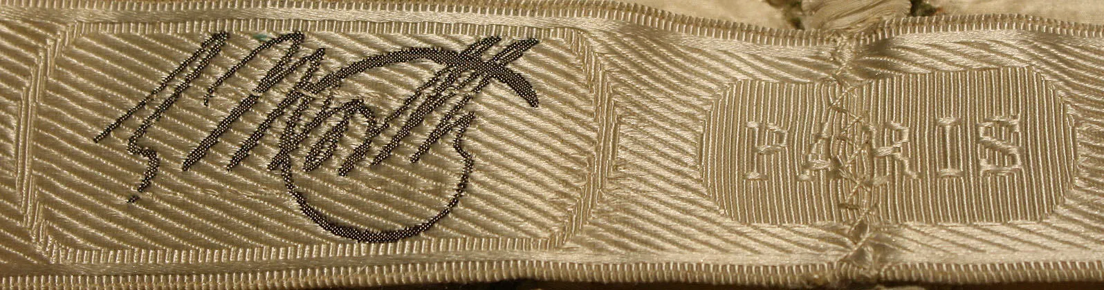 Label van House of Worth