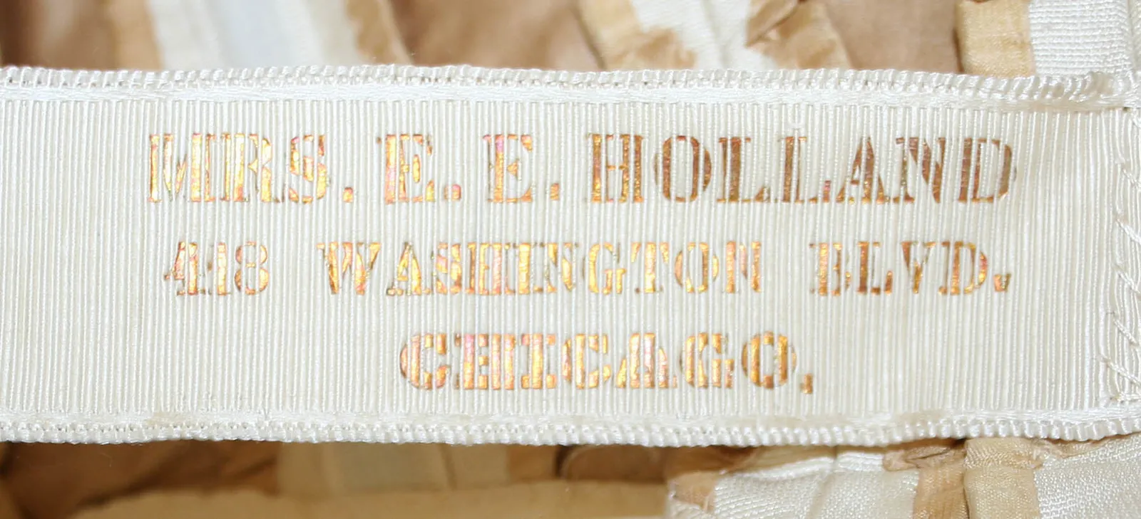 Label van Mrs. E. E. Holland