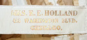 Label van Mrs. E. E. Holland