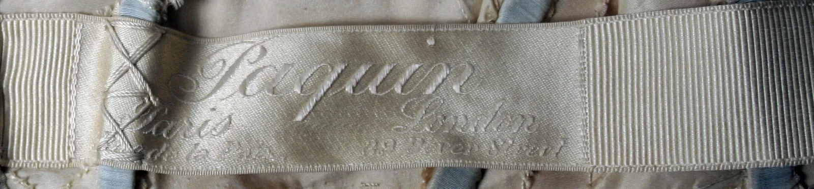 Label van House of Paquin