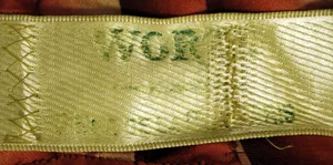 Label van House of Worth